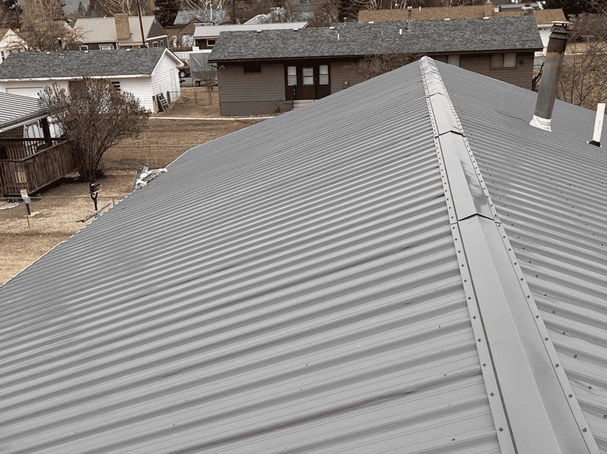 New metal roofing installed on residential home for durability and weather resistance.