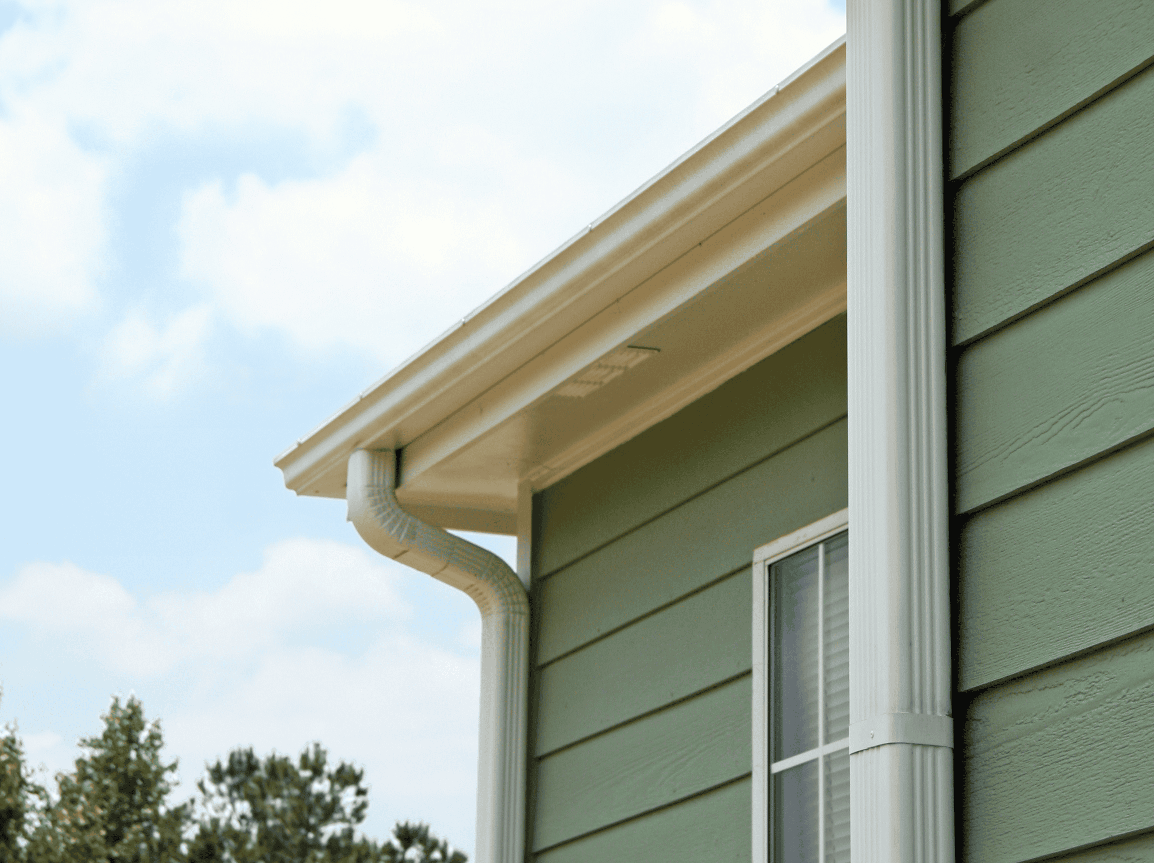 High-quality siding installation on a residential home, showcasing durable and attractive exterior c.