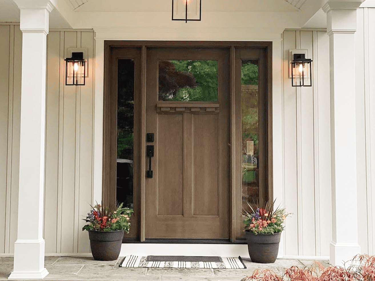 Modern Front Door Front door with sidelights and outdoor lighting.