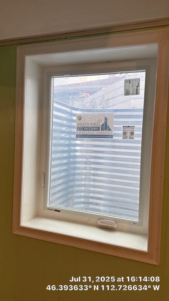 Window Installation at Example Co New double-glazed window installed in a residential interior for improved insulation.