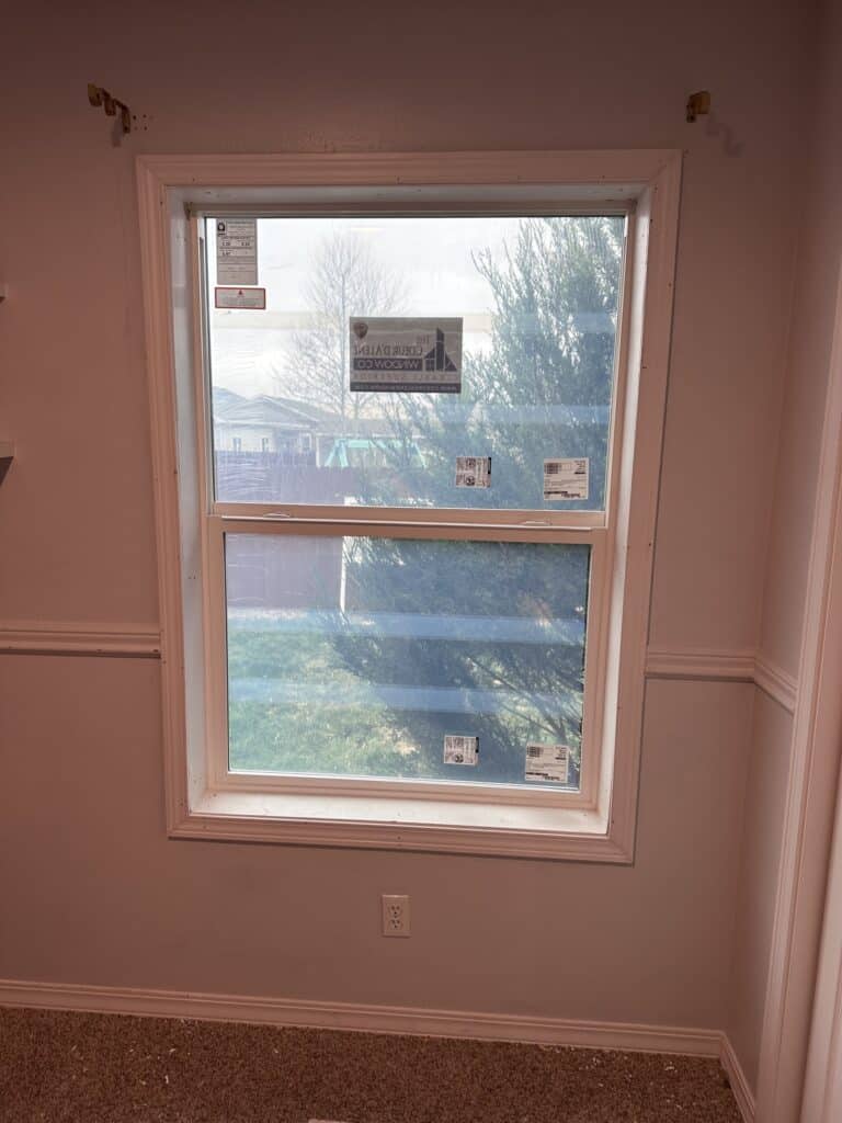 Window Installation New double-pane window installed in a residential home for improved insulation and natural light.