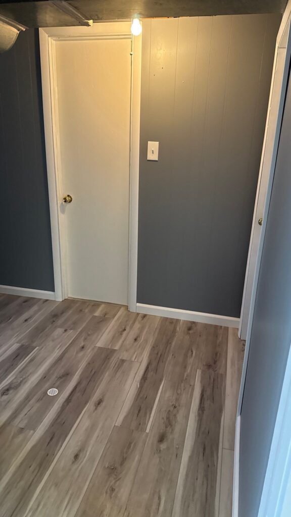 Modern Interior Wall and Door Interior wall with a door and light switch in a residential space.