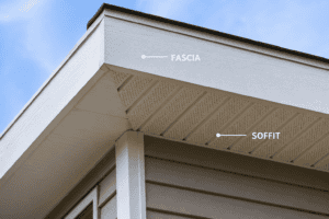Close-up of house fascia and soffit with labels highlighting construction details.