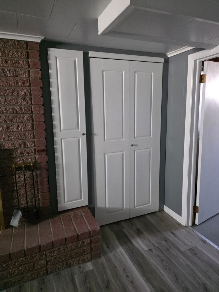 Closet Doors Closet doors installation by Example Co. showcasing durable, stylish white doors for interior spaces.