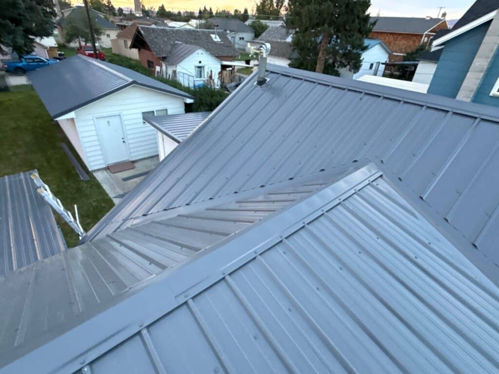 Close-up of a newly installed metal roof on residential home.
